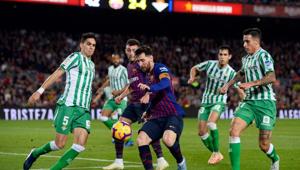 Barcelona's Argentinian forward Lionel Messi (C) vies with Real Betis' Spanish defender Marc Bartra (L) during the Spanish league football match between FC Barcelona and Real Betis at the Camp Nou stadium in Barcelona on November 11, 2018.(AFP) Barcelona's Argentinian forward Lionel Messi (C) vies with Real Betis' Spanish defender Marc Bartra (L) during the Spanish league football match between FC Barcelona and Real Betis at the Camp Nou stadium in Barcelona on November 11, 2018.(AFP)