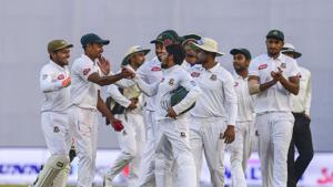 Bangladesh cricketers congratulate teammate Taijul Islam (2R) as they walk off the field after the third day of the second Test cricket match between Bangladesh and Zimbabwe at the Sher-e-Bangla National Cricket Stadium in Dhaka on November 13, 2018.(AFP) Bangladesh cricketers congratulate teammate Taijul Islam (2R) as they walk off the field after the third day of the second Test cricket match between Bangladesh and Zimbabwe at the Sher-e-Bangla National Cricket Stadium in Dhaka on November 13, 2018.(AFP)