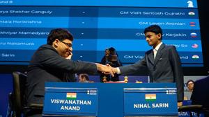 KOLKATA, WEST BENGAL, INDIA - 2018/11/11: Indian chess Grandmaster Viswanathan Anand (left) greets Indian chess Grandmaster Nihal Sarin (right) before the eightieth round matches of rapid chess at Tata Steel Chess India 2018.(LightRocket via Getty Images) KOLKATA, WEST BENGAL, INDIA - 2018/11/11: Indian chess Grandmaster Viswanathan Anand (left) greets Indian chess Grandmaster Nihal Sarin (right) before the eightieth round matches of rapid chess at Tata Steel Chess India 2018.(LightRocket via Getty Images)
