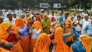 Congress party ticket seekers and party workers from Todabhim Rajasthan dance inside the AICC office in New Delhi on October 30.(PTI File Photo) Congress party ticket seekers and party workers from Todabhim Rajasthan dance inside the AICC office in New Delhi on October 30.(PTI File Photo)