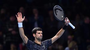 Serbia's Novak Djokovic celebrates beating Germany's Alexander Zverev during their mens singles round-robin match on day four of the ATP World Tour Finals tennis tournament at the O2 Arena.(AFP)