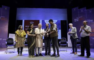 Anuk Arudpragasam (centre, in brown) being handed the DSC Prize 2017 at the Dhaka Literature Festival.(Courtesy DSC Prize) Anuk Arudpragasam (centre, in brown) being handed the DSC Prize 2017 at the Dhaka Literature Festival.(Courtesy DSC Prize)