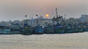 Fishing boats docked at a fishing harbor as a part of precautionary measures in view of cyclonic storm 'Gaja', in Chennai.(PTI Photo)