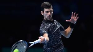Serbia's Novak Djokovic returns against Germany's Alexander Zverev during their mens singles round-robin match on day four of the ATP World Tour Finals tennis tournament at the O2 Arena in London(AFP)
