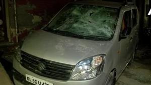 A car and three bikes parked outside AAP leader Jitendra Kumar’s house were damaged in the firing incident that took place on Thursday, November 15, 2018.(Photo Credit: ANI@Twitter) A car and three bikes parked outside AAP leader Jitendra Kumar’s house were damaged in the firing incident that took place on Thursday, November 15, 2018.(Photo Credit: ANI@Twitter)