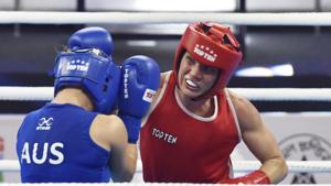 New Delhi, India - Nov. 16, 2018: Finland's Mira Potkonen (in Red) in a bout against Australian`s Anja Stridsman (in Blue) in Women's 60 kg category, during AIBA Women's World Boxing Championships 2018, at IG Stadium, in New Delhi.(Sanjeev Verma/HT PHOTO) New Delhi, India - Nov. 16, 2018: Finland's Mira Potkonen (in Red) in a bout against Australian`s Anja Stridsman (in Blue) in Women's 60 kg category, during AIBA Women's World Boxing Championships 2018, at IG Stadium, in New Delhi.(Sanjeev Verma/HT PHOTO)