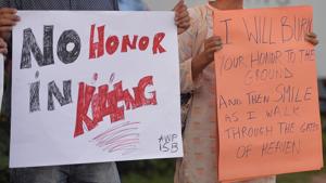 Pakistani civil society activists carry placards during a protest in Islamabad on July 18, 2016 against the murder of social media celebrity Qandeel Baloch by her own brother.(AFP) Pakistani civil society activists carry placards during a protest in Islamabad on July 18, 2016 against the murder of social media celebrity Qandeel Baloch by her own brother.(AFP)