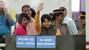 Trupti Desai, a women's rights activist, waves from inside the Cochin International Airport at Kochi on Friday.(REUTERS) Trupti Desai, a women's rights activist, waves from inside the Cochin International Airport at Kochi on Friday.(REUTERS)