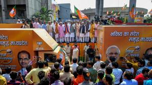 Madhya Pradesh chief minister Shivraj Singh Chouhan with Union minister Narendra Singh Tomar, State BJP president Rakesh Singh and other leaders flag off the an election campaign in Bhopal on October 21.(PTI Photo) Madhya Pradesh chief minister Shivraj Singh Chouhan with Union minister Narendra Singh Tomar, State BJP president Rakesh Singh and other leaders flag off the an election campaign in Bhopal on October 21.(PTI Photo)