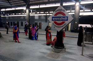 Women commuters wait for a train at the newly inaugurated Bamandongri railway station. They have raised concerns about their safety, especially when they travel at night.(Bachchan Kumar/HT)