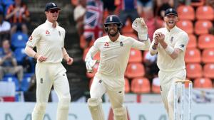 England's wicketkeeper Ben Foakes (C) celebrates with teammates Ben Stokes (R) and Keaton Jennings (L).(AFP) England's wicketkeeper Ben Foakes (C) celebrates with teammates Ben Stokes (R) and Keaton Jennings (L).(AFP)