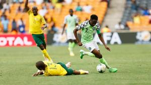 South Africa's Tiyani Mabunda (L) is tackled by Nigeria's captain Ahmed Musa during the African Cup of Nations qualifier match between South Africa and Nigeria on November 17, 2018 at Soccer City Stadium in Johannesburg, South Africa(AFP) South Africa's Tiyani Mabunda (L) is tackled by Nigeria's captain Ahmed Musa during the African Cup of Nations qualifier match between South Africa and Nigeria on November 17, 2018 at Soccer City Stadium in Johannesburg, South Africa(AFP)