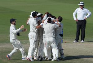 New Zealand captain Kane Williamson celebrates with teammates after beating Pakistan in the first Test cricket match between Pakistan and New Zealand at the Sheikh Zayed International Cricket Stadium in Abu Dhabi on November 19, 2018. (Photo by AAMIR QURESHI / AFP)(AFP) New Zealand captain Kane Williamson celebrates with teammates after beating Pakistan in the first Test cricket match between Pakistan and New Zealand at the Sheikh Zayed International Cricket Stadium in Abu Dhabi on November 19, 2018. (Photo by AAMIR QURESHI / AFP)(AFP)