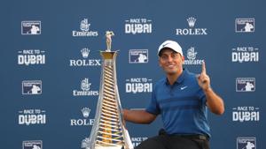 Francesco Molinari of Italy poses with the Race to Dubai trophy following the final round of the DP World Tour Championship at Jumeirah Golf Estates golf course in Dubai.(AFP) Francesco Molinari of Italy poses with the Race to Dubai trophy following the final round of the DP World Tour Championship at Jumeirah Golf Estates golf course in Dubai.(AFP)