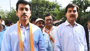 BJP's candidate from Jhotwara, Rajpal Singh (Right) arrives with Union minister Rajyavardhan SIngh to file his nomination for assembly seat , in Jaipur on Monday.(HT Photo) BJP's candidate from Jhotwara, Rajpal Singh (Right) arrives with Union minister Rajyavardhan SIngh to file his nomination for assembly seat , in Jaipur on Monday.(HT Photo)
