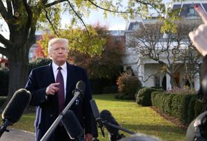 US President Donald Trump speaks to the news media while walking to board Marine One to depart for travel to Mar-a-Lago from the White House in Washington.(REUTERS) US President Donald Trump speaks to the news media while walking to board Marine One to depart for travel to Mar-a-Lago from the White House in Washington.(REUTERS)