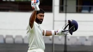 Wasim Jaffer lifts his bat as he scored the double century during Irani Cup match.(PTI)