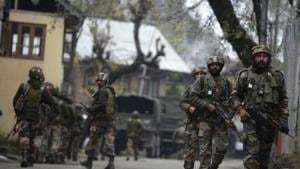 Indian army soldiers patrol during a cordon and search operation for suspected militants in Shuhama on the outskirts of Srinagar.(AFP) Indian army soldiers patrol during a cordon and search operation for suspected militants in Shuhama on the outskirts of Srinagar.(AFP)