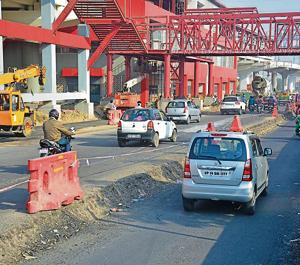 Contractors of the Delhi Metro Rail Corporation are resorting to digging up the main GT Road outside river Hindon metro station to make more height available for passing bigger commercial vehicles, in Ghaziabad, India on Friday(Sakib Ali/ HT Photo) Contractors of the Delhi Metro Rail Corporation are resorting to digging up the main GT Road outside river Hindon metro station to make more height available for passing bigger commercial vehicles, in Ghaziabad, India on Friday(Sakib Ali/ HT Photo)