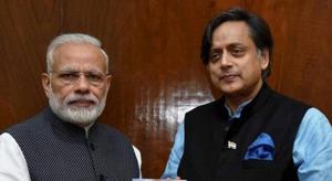 New Delhi: Congress MP Shashi Tharoor presents to Prime Minister Narendra Modi a copy of his book titled ‘An Era of Darkness : The British Empire in India’ in New Delhi(PTI) New Delhi: Congress MP Shashi Tharoor presents to Prime Minister Narendra Modi a copy of his book titled ‘An Era of Darkness : The British Empire in India’ in New Delhi(PTI)