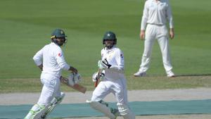 Pakistani batsmen Azhar Ali (C) and Haris Sohail (L) run between the wickets as New Zealand captain Kane Williamson (R) looks on during the first day of the second Test cricket match between Pakistan and New Zealand(AFP) Pakistani batsmen Azhar Ali (C) and Haris Sohail (L) run between the wickets as New Zealand captain Kane Williamson (R) looks on during the first day of the second Test cricket match between Pakistan and New Zealand(AFP)