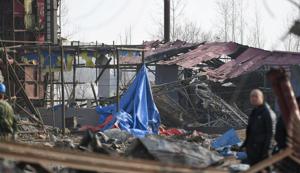 Damaged houses are seen on the following day at the site of an explosion at a machinery plant, in Liaoyuan, Jilin province, China.(REUTERS) Damaged houses are seen on the following day at the site of an explosion at a machinery plant, in Liaoyuan, Jilin province, China.(REUTERS)
