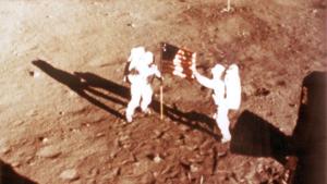 In this NASA handout file photo taken on July 20, 1969, US astronauts Neil Armstrong and "Buzz" Aldrin deploy the US flag on the lunar surface during the Apollo 11 lunar landing mission.(AFP File Photo) In this NASA handout file photo taken on July 20, 1969, US astronauts Neil Armstrong and "Buzz" Aldrin deploy the US flag on the lunar surface during the Apollo 11 lunar landing mission.(AFP File Photo)