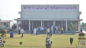 Members of the Nirankari spiritual group stand outside a building following the grenade attack at the Nirankari Satsang Bhawan centre, at Adliwal village, near Rajasansi, Amritsar on November 18.(HT File Photo) Members of the Nirankari spiritual group stand outside a building following the grenade attack at the Nirankari Satsang Bhawan centre, at Adliwal village, near Rajasansi, Amritsar on November 18.(HT File Photo)