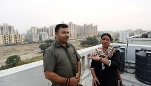 Pratap Chauhan with his wife Rekha Rani lead an isolated life in their fifth floor DDA flat in Narela, Sector G-2.(Amal KS/HT PHOTO) Pratap Chauhan with his wife Rekha Rani lead an isolated life in their fifth floor DDA flat in Narela, Sector G-2.(Amal KS/HT PHOTO)