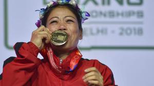 Indian boxer Mary Kom kisses her gold medal after winning the final match of women's light flyweight 45-48 kg against Ukraine's Hanna Okhota at AIBA Women's World Boxing Championships(PTI) Indian boxer Mary Kom kisses her gold medal after winning the final match of women's light flyweight 45-48 kg against Ukraine's Hanna Okhota at AIBA Women's World Boxing Championships(PTI)