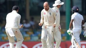 England's Jack Leach (2nd L) celebrates with captain Joe Root after taking the wicket of Sri Lanka's Niroshan Dickwella.(REUTERS) England's Jack Leach (2nd L) celebrates with captain Joe Root after taking the wicket of Sri Lanka's Niroshan Dickwella.(REUTERS)
