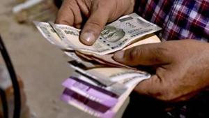 The rupee depreciated by 50 paise to 70.08 against the US dollar in early trade Monday.(PTI) The rupee depreciated by 50 paise to 70.08 against the US dollar in early trade Monday.(PTI)