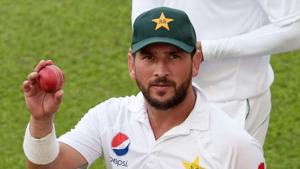 Pakistani cricketer Yasir Shah holds a ball after beating New Zealand in the second Test in Dubai.(AFP) Pakistani cricketer Yasir Shah holds a ball after beating New Zealand in the second Test in Dubai.(AFP)
