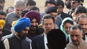 Pakistan Prime Minister Imran Khan (C) and alongside Indian Minister for Food Processing Industries Harsimrat Kaur Badal (2R) and India's Punjab cabinet minister and former cricketer Navjot Singh Sidhu (3L), arrive to attend the groundbreaking ceremony for the Kartarpur Corridor in Kartarpur on November 28, 2018.(AFP) Pakistan Prime Minister Imran Khan (C) and alongside Indian Minister for Food Processing Industries Harsimrat Kaur Badal (2R) and India's Punjab cabinet minister and former cricketer Navjot Singh Sidhu (3L), arrive to attend the groundbreaking ceremony for the Kartarpur Corridor in Kartarpur on November 28, 2018.(AFP)
