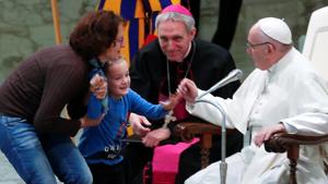 A boy held by his mother reacts during the general audience led by Pope Francis at Paul VI hall at the Vatican, November 28, 2018.(Reuters) A boy held by his mother reacts during the general audience led by Pope Francis at Paul VI hall at the Vatican, November 28, 2018.(Reuters)