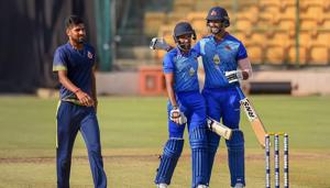 Bengaluru: Mumbai's Dhaval Kulkarni and Shivam Dubey celebrate after beating Delhi in Vijay Hazare trophy final match, at Chinnaswamy Stadium in Bengaluru, Saturday, Oct 20, 2018(PTI) Bengaluru: Mumbai's Dhaval Kulkarni and Shivam Dubey celebrate after beating Delhi in Vijay Hazare trophy final match, at Chinnaswamy Stadium in Bengaluru, Saturday, Oct 20, 2018(PTI)
