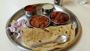The Mutton Thali at Padma Guest House, Kolhapur. No thali here is complete without the Tambda Rassa (an intensely stormy red gravy with a tarri floating on top) and Pandhra Rassa (a delicately spiced, white, buttery gravy of coconut and garam masala). The Mutton Thali at Padma Guest House, Kolhapur. No thali here is complete without the Tambda Rassa (an intensely stormy red gravy with a tarri floating on top) and Pandhra Rassa (a delicately spiced, white, buttery gravy of coconut and garam masala).