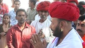 Otaram Dewasi (in maroon headgear) is the BJP candidate from Sirohi in the December 7 Rajasthan Assembly Election. He is also the minister for cow welfare in the Vasundhara Raje cabinet.(HT Photo) Otaram Dewasi (in maroon headgear) is the BJP candidate from Sirohi in the December 7 Rajasthan Assembly Election. He is also the minister for cow welfare in the Vasundhara Raje cabinet.(HT Photo)