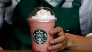 A waitress prepares a beverage at a branch of Starbucks coffee in Tokyo, Japan on August 13, 2018.(Reuters) A waitress prepares a beverage at a branch of Starbucks coffee in Tokyo, Japan on August 13, 2018.(Reuters)