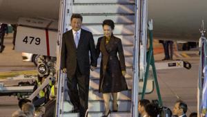 Xi Jinping, China's president, center left, and Peng Liyuan, China's first lady, exit a plane as they arrive at Ezeiza Airport ahead of the G-20 Leaders' Summit in Buenos Aires, Argentina, on Thursday, November 29, 2018.(Bloomberg) Xi Jinping, China's president, center left, and Peng Liyuan, China's first lady, exit a plane as they arrive at Ezeiza Airport ahead of the G-20 Leaders' Summit in Buenos Aires, Argentina, on Thursday, November 29, 2018.(Bloomberg)