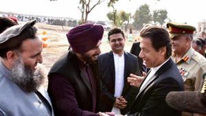 Pakistan's Prime Minister Imran Khan shakes hands with cricketer-turned politician Navjot Singh Sidhu during ground breaking ceremony for Kartarpur corridor in Pakistan's Kartarpur, November 28, 2018(PTI) Pakistan's Prime Minister Imran Khan shakes hands with cricketer-turned politician Navjot Singh Sidhu during ground breaking ceremony for Kartarpur corridor in Pakistan's Kartarpur, November 28, 2018(PTI)