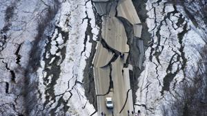 This aerial photo shows damage on Vine Road, south of Wasilla, Alaska, after earthquakes Friday, Nov. 30, 2018.(AP) This aerial photo shows damage on Vine Road, south of Wasilla, Alaska, after earthquakes Friday, Nov. 30, 2018.(AP)