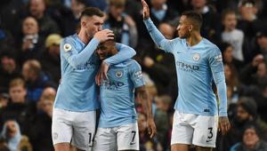 Manchester City's English midfielder Raheem Sterling (C) celebrates scoring their second goal against Bournemouth.(AFP) Manchester City's English midfielder Raheem Sterling (C) celebrates scoring their second goal against Bournemouth.(AFP)