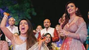 Priyanka Chopra and Parineeti Chopra at Priyanka's wedding with American singer Nick Jonas in Jodhpur.(IANS) Priyanka Chopra and Parineeti Chopra at Priyanka's wedding with American singer Nick Jonas in Jodhpur.(IANS)