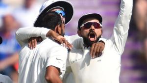 Virat Kohli (R) celebrates with teammates after England's Jonny Bairstow is bowled by India's Mohammed Shami.(AFP) Virat Kohli (R) celebrates with teammates after England's Jonny Bairstow is bowled by India's Mohammed Shami.(AFP)