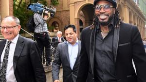 West Indies cricketer Chris Gayle reacts as he leaves the New South Wales Supreme Court after winning a defamation case against an Australian media company in Sydney.(REUTERS) West Indies cricketer Chris Gayle reacts as he leaves the New South Wales Supreme Court after winning a defamation case against an Australian media company in Sydney.(REUTERS)