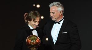 Real Madrid's Croatian midfielder Luka Modric (L) is congratulated by Former French footballer and host David Ginola after receiving the 2018 FIFA Men's Ballon d'Or award for best player of the year during the 2018 FIFA Ballon d'Or award ceremony at the Grand Palais in Paris.(AFP) Real Madrid's Croatian midfielder Luka Modric (L) is congratulated by Former French footballer and host David Ginola after receiving the 2018 FIFA Men's Ballon d'Or award for best player of the year during the 2018 FIFA Ballon d'Or award ceremony at the Grand Palais in Paris.(AFP)