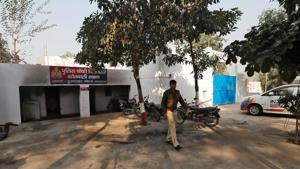 A police officer walks in the premises of a police station that was partially damaged by a mob during a protest on Monday in Chingrawti village of Bulandshahr district in Uttar Pradesh.(REUTERS) A police officer walks in the premises of a police station that was partially damaged by a mob during a protest on Monday in Chingrawti village of Bulandshahr district in Uttar Pradesh.(REUTERS)