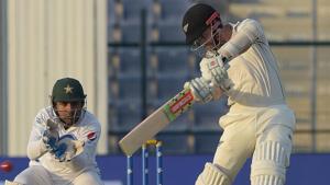 New Zealand captain Kane Williamson (R) plays a shot as Pakistani wicketkeeper captain Sarfraz Ahmed looks on.(AFP) New Zealand captain Kane Williamson (R) plays a shot as Pakistani wicketkeeper captain Sarfraz Ahmed looks on.(AFP)