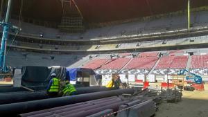A picture take on December 4, 2018, shows workers at the Al-Bayt Stadium in the city of al-Khor, northeast of Qatar(AFP) A picture take on December 4, 2018, shows workers at the Al-Bayt Stadium in the city of al-Khor, northeast of Qatar(AFP)